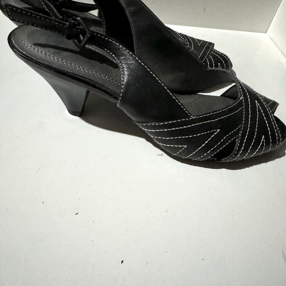 Naturalizer women’s peep toe pumps.
